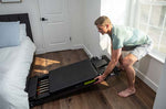 Balanced Body Metro IQ Reformer inschuiven en opbergen naast een bed