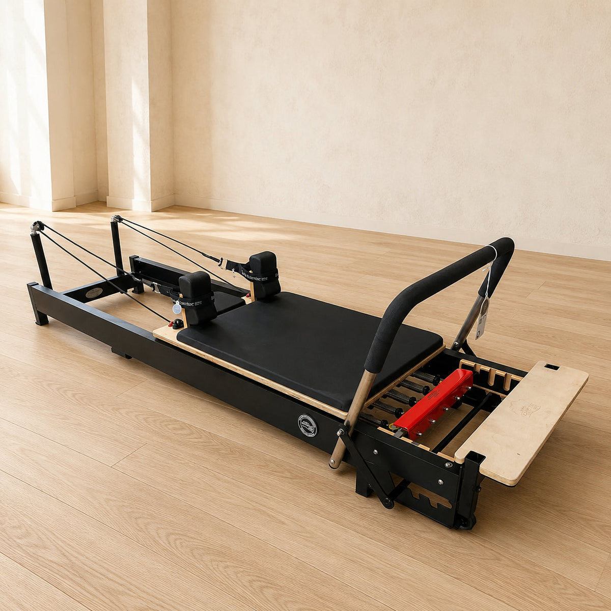 Body & Exercise Reformer Black Edition in een warme pilatesstudio