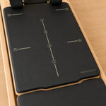 Carriage met positiemarkeringen van de Body & Exercise Reformer Studio